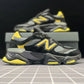 NEW BALANCE 9060 BLACK AND YELLOW